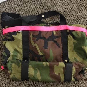 Andi hot pink and camo shoulder bag